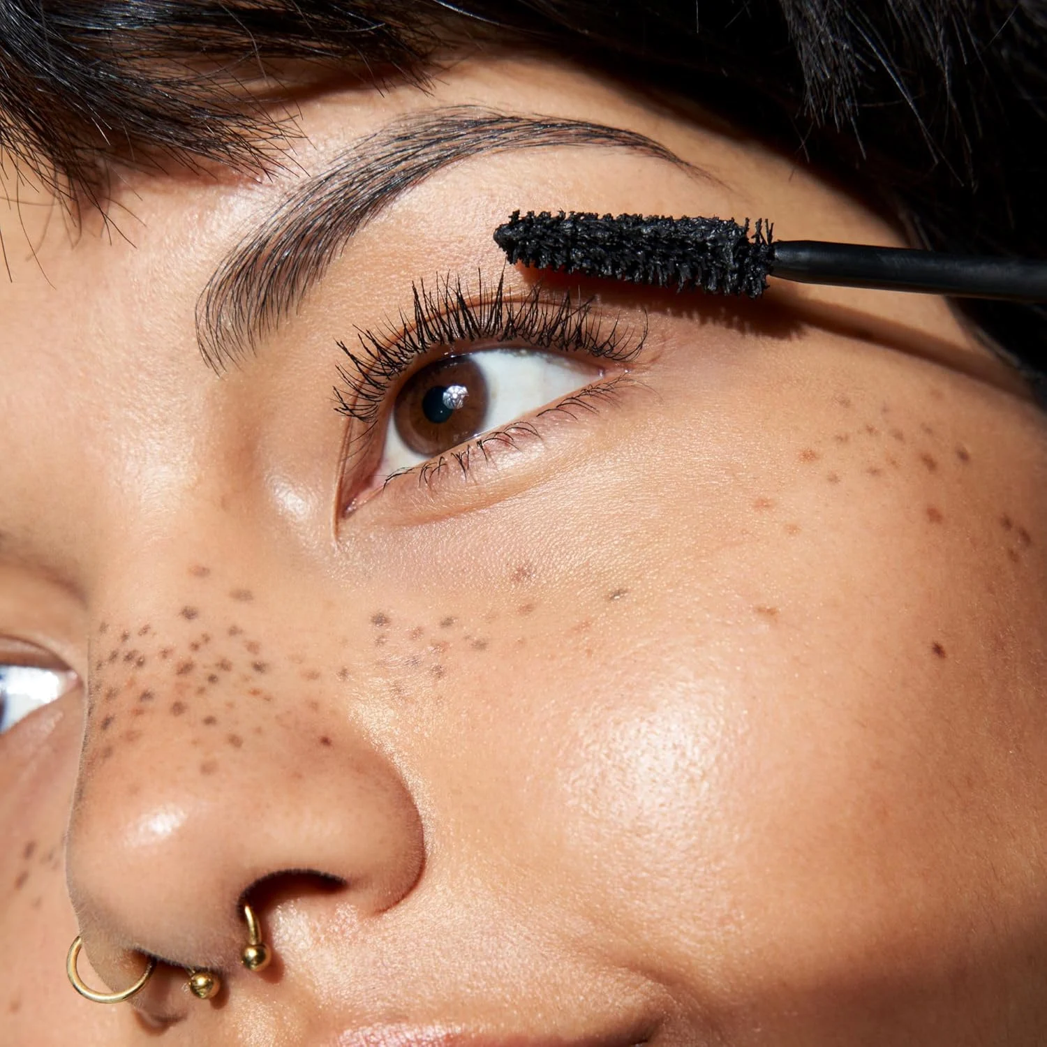 Applying Essence Lash Princess False Lash Effect Mascara to eyelashes